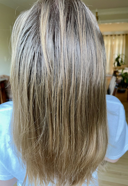 Back of head showing day 2 hair after using Olaplex Hair Repair System