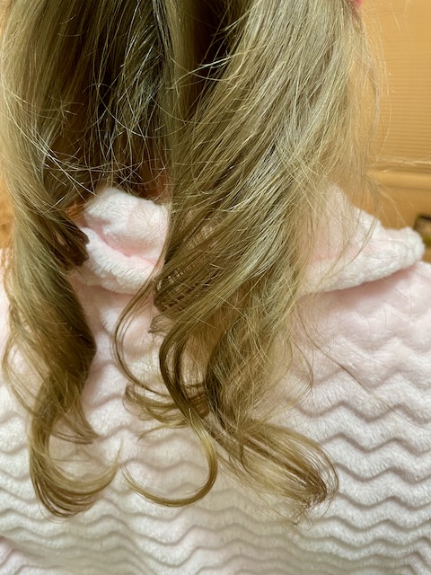 back of head showing first two curls made with the Dyson Airwrap